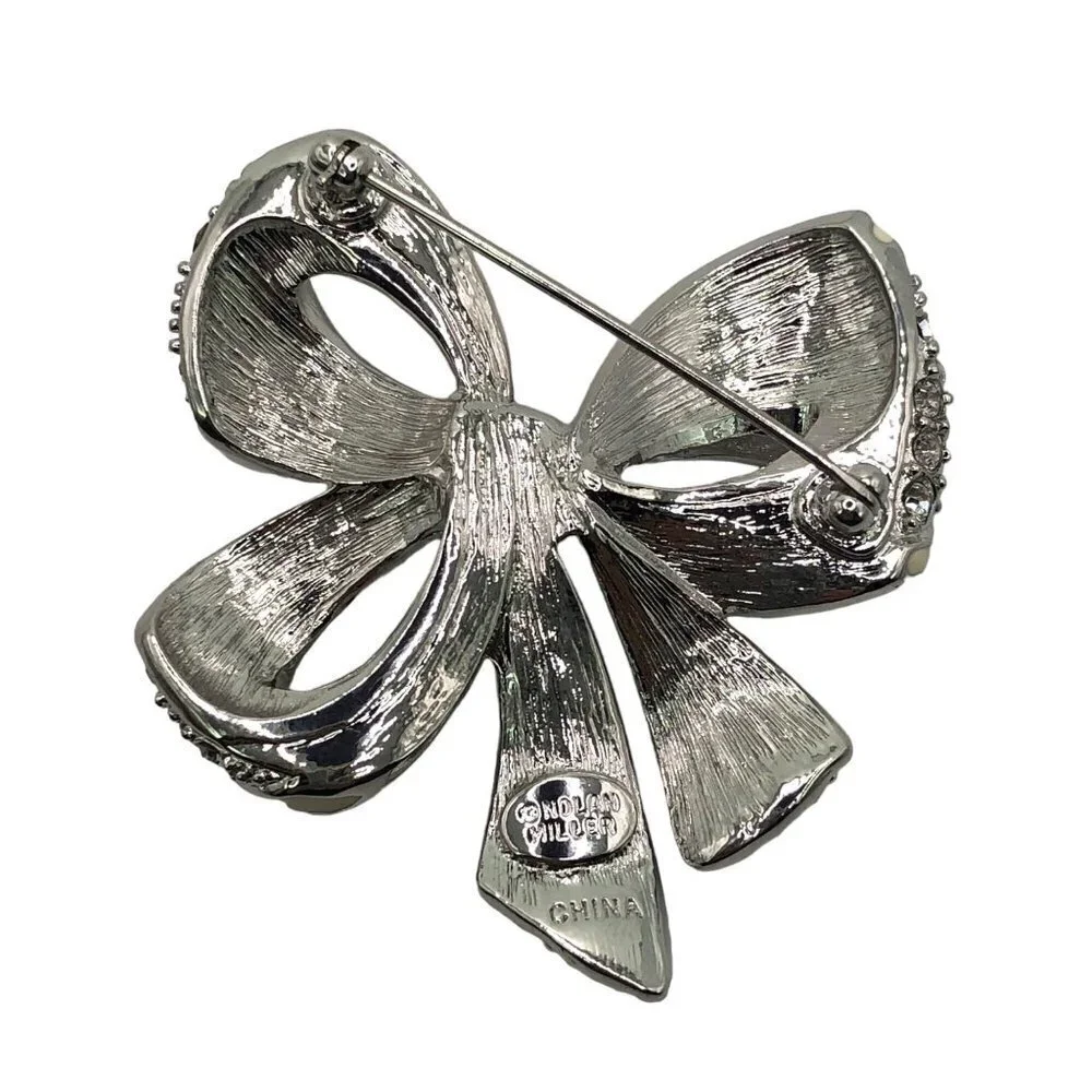 Nolan‎ Miller Bow Pin Brooch Rhinestone Enamel Silver Tone